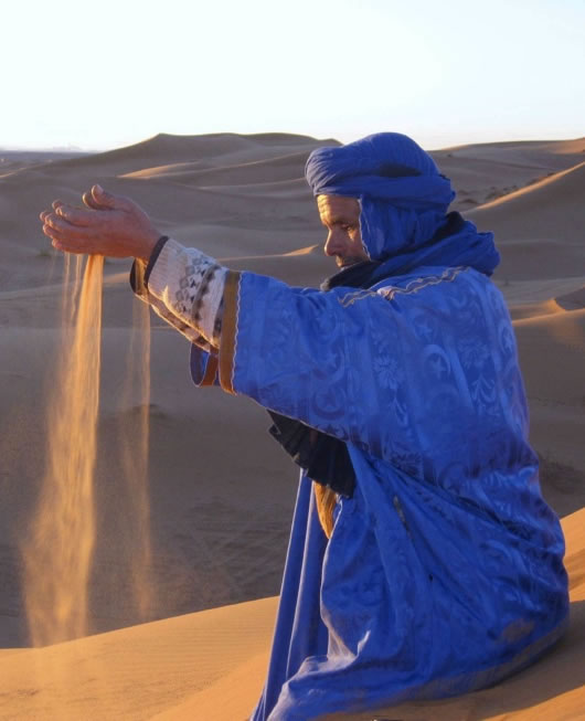 Man enjoying the desert sand